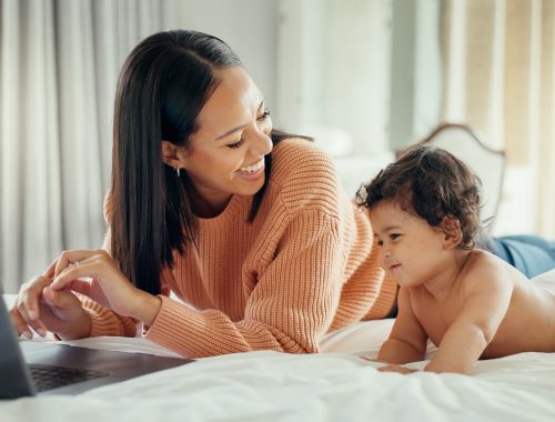 Remote work, love and mother with baby in a bed for bonding, relax and playing in their home. Work