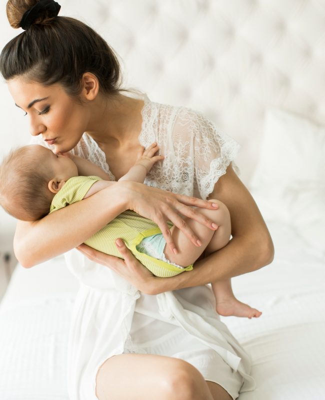 Young woman with baby girl